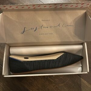 Rothy’s Heathered Black pointed flat.